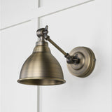 This is an image showing From The Anvil - Aged Brass Brindley Wall Light available from T.H Wiggans Architectural Ironmongery in Kendal, quick delivery and discounted prices