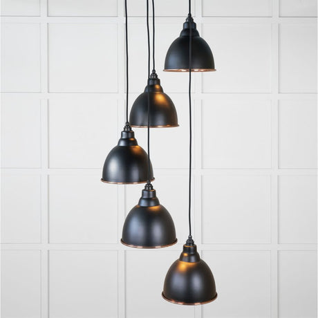 This is an image showing From The Anvil - Hammered Copper Brindley Cluster Pendant in Elan Black available from T.H Wiggans Architectural Ironmongery in Kendal, quick delivery and discounted prices