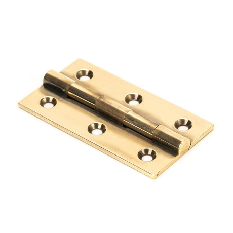 This is an image showing From The Anvil - Aged Brass 2.5" Butt Hinge (pair) available from T.H Wiggans Architectural Ironmongery in Kendal, quick delivery and discounted prices