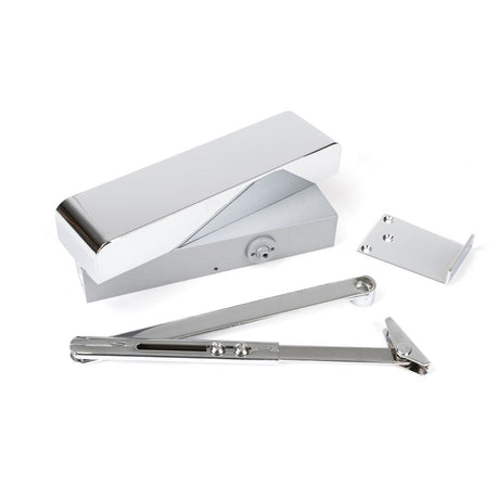 This is an image of From The Anvil - Polished Chrome Size 2-5 Door Closer & Cover available to order from T.H Wiggans Architectural Ironmongery in Kendal, quick delivery and discounted prices.