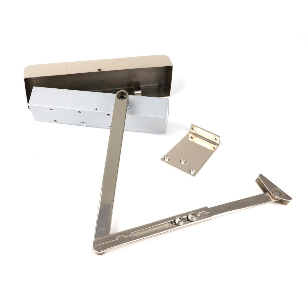 This is an image showing From The Anvil - Polished Nickel Size 2-5 Door Closer & Cover available from trade door handles, quick delivery and discounted prices