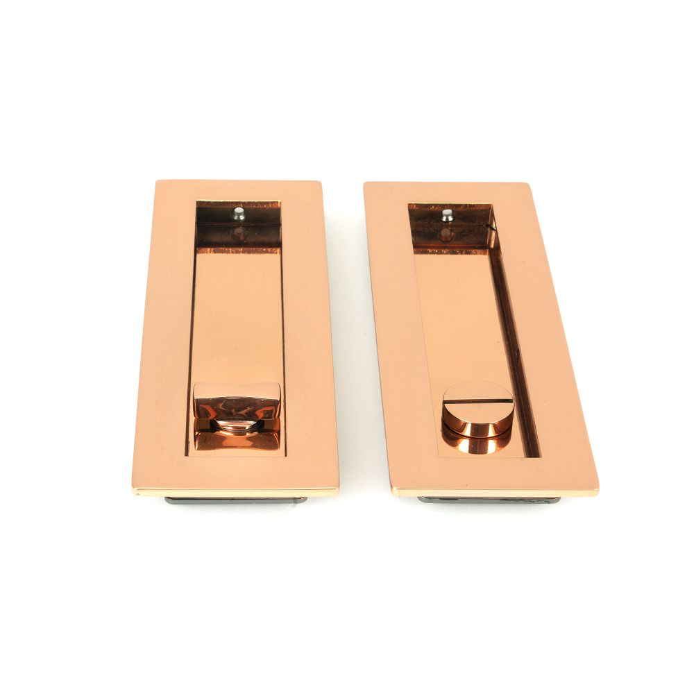 This is an image showing From The Anvil - Polished Bronze 175mm Plain Rectangular Pull - Privacy Set available from trade door handles, quick delivery and discounted prices