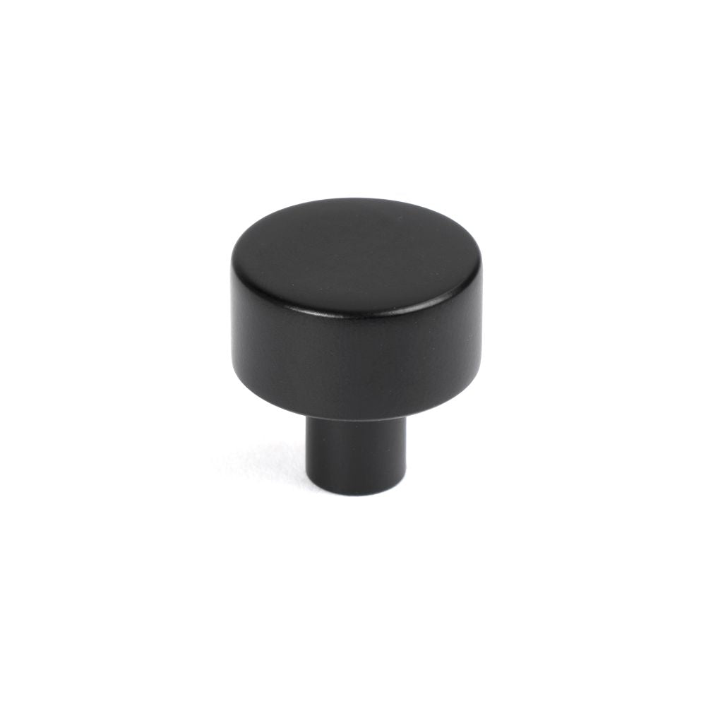 This is an image showing From The Anvil - Matt Black Kelso Cabinet Knob - 25mm (No rose) available from T.H Wiggans Architectural Ironmongery in Kendal, quick delivery and discounted prices