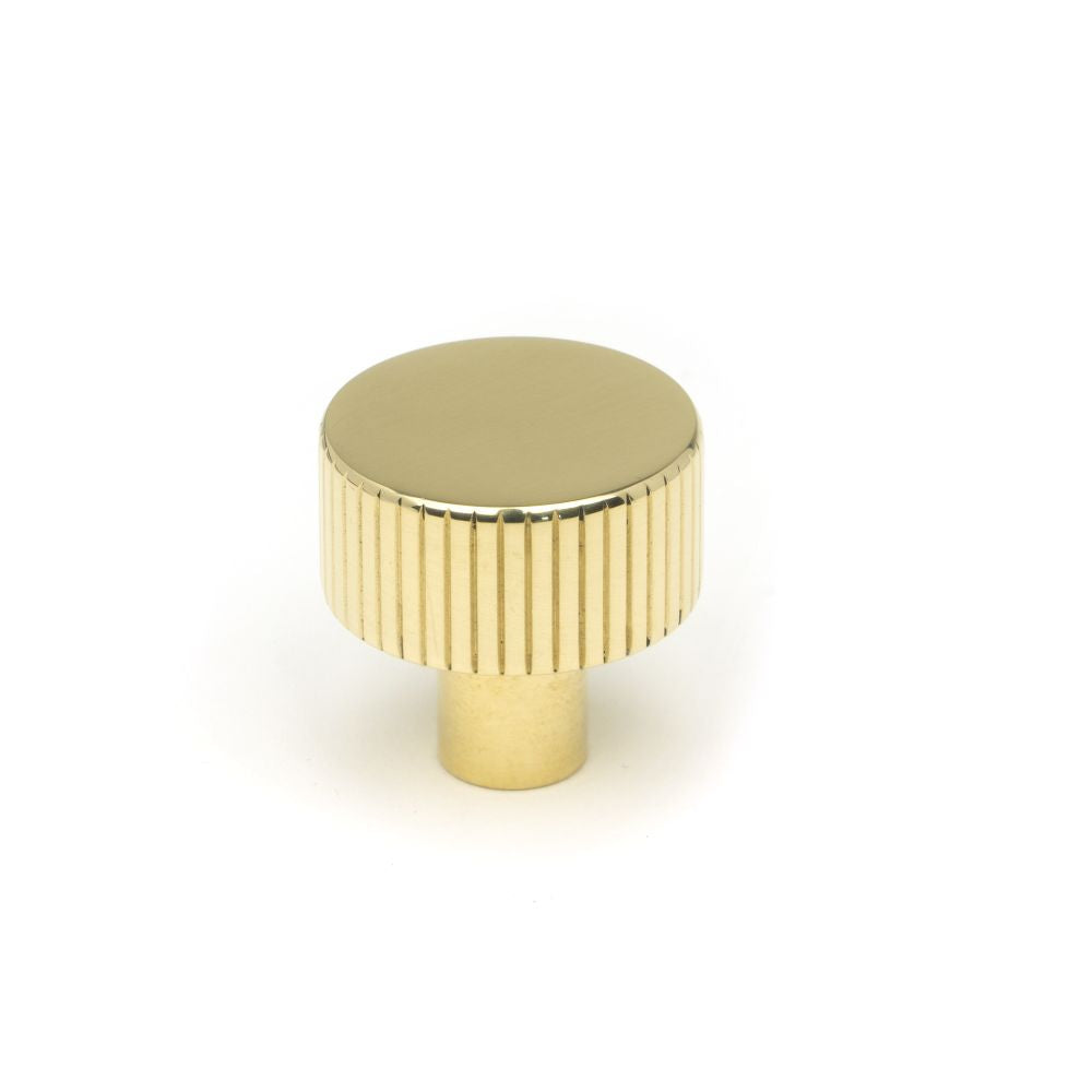 This is an image showing From The Anvil - Polished Brass Judd Cabinet Knob - 25mm (No Rose) available from T.H Wiggans Architectural Ironmongery in Kendal, quick delivery and discounted prices