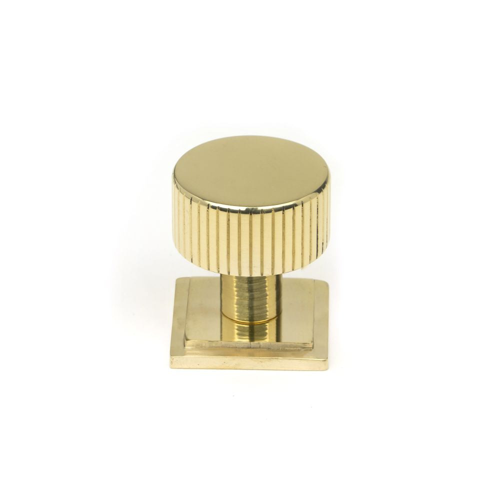 This is an image showing From The Anvil - Polished Brass Judd Cabinet Knob - 25mm (Square) available from T.H Wiggans Architectural Ironmongery in Kendal, quick delivery and discounted prices