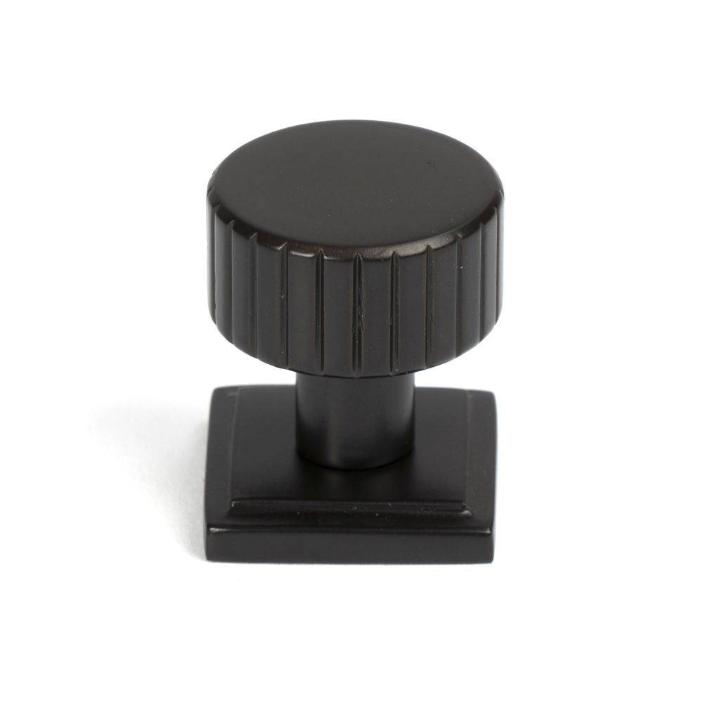 This is an image showing From The Anvil - Aged Bronze Judd Cabinet Knob - 25mm (Square) available from T.H Wiggans Architectural Ironmongery in Kendal, quick delivery and discounted prices