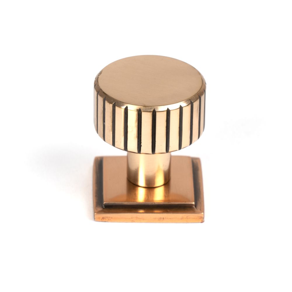 This is an image showing From The Anvil - Polished Bronze Judd Cabinet Knob - 25mm (Square) available from T.H Wiggans Architectural Ironmongery in Kendal, quick delivery and discounted prices