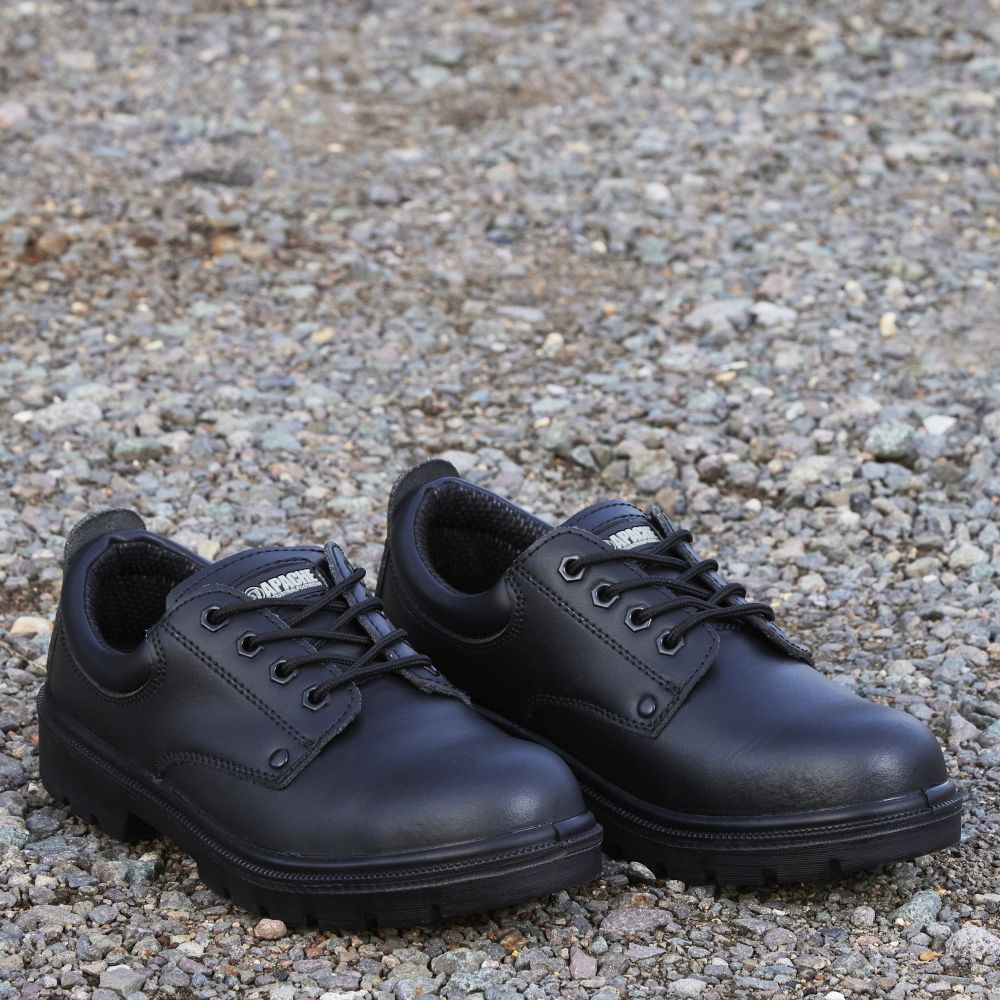 This is an image of Apache - Black 4 Eye Safety Shoe AP306 9 available to order from T.H Wiggans Architectural Ironmongery in Kendal, quick delivery and discounted prices.