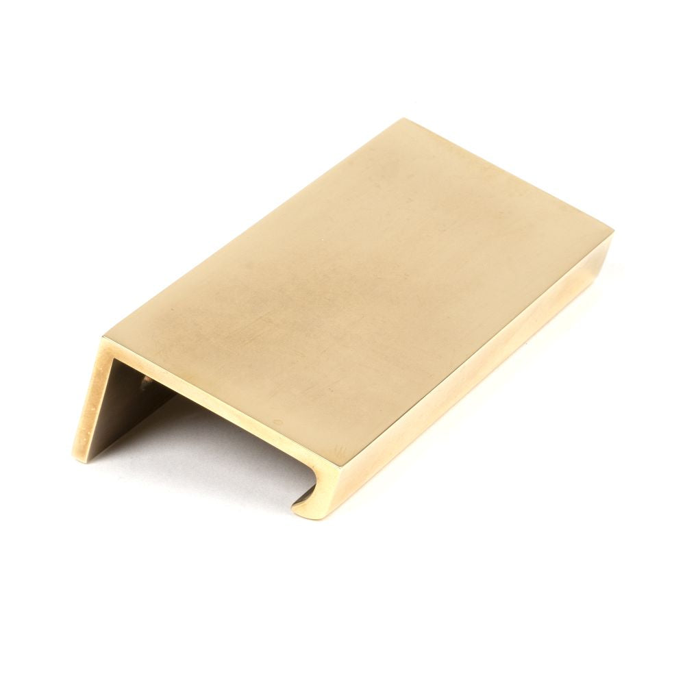 This is an image showing From The Anvil - Aged Brass 100mm Plain Edge Pull available from T.H Wiggans Architectural Ironmongery in Kendal, quick delivery and discounted prices