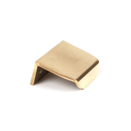 This is an image showing From The Anvil - Aged Brass 50mm Moore Edge Pull available from T.H Wiggans Architectural Ironmongery in Kendal, quick delivery and discounted prices