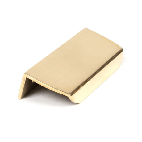 This is an image showing From The Anvil - Aged Brass 100mm Moore Edge Pull available from T.H Wiggans Architectural Ironmongery in Kendal, quick delivery and discounted prices