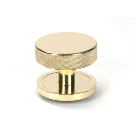 This is an image of From The Anvil - Polished Brass Brompton Centre Door Knob (Plain) available to order from T.H Wiggans Architectural Ironmongery in Kendal, quick delivery and discounted prices.