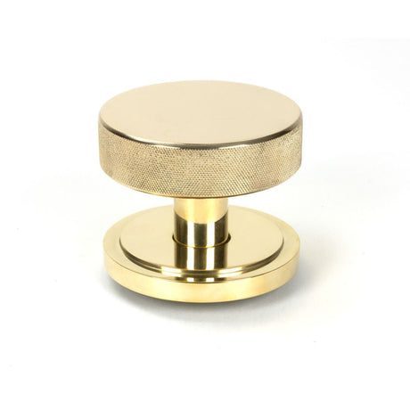 This is an image of From The Anvil - Polished Brass Brompton Centre Door Knob (Art Deco) available to order from T.H Wiggans Architectural Ironmongery in Kendal, quick delivery and discounted prices.