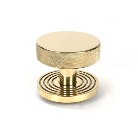 This is an image of From The Anvil - Polished Brass Brompton Centre Door Knob (Beehive) available to order from T.H Wiggans Architectural Ironmongery in Kendal, quick delivery and discounted prices.