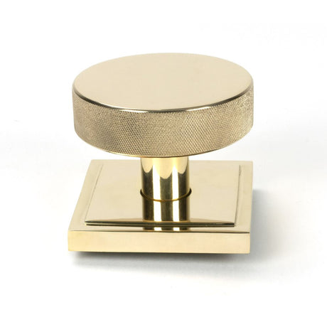 This is an image of From The Anvil - Polished Brass Brompton Centre Door Knob (Square) available to order from T.H Wiggans Architectural Ironmongery in Kendal, quick delivery and discounted prices.