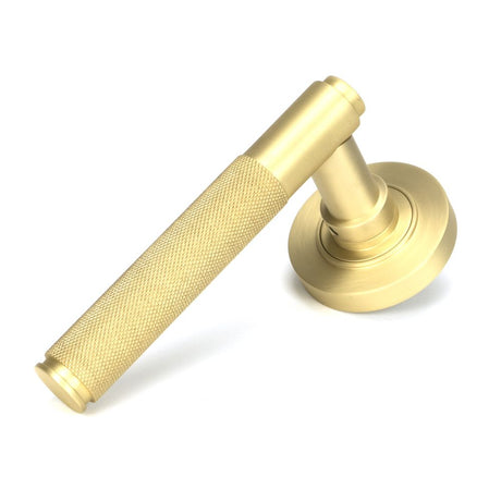 This is an image of From The Anvil - Satin Brass Brompton Lever on Rose Set (Plain) available to order from T.H Wiggans Architectural Ironmongery in Kendal, quick delivery and discounted prices.