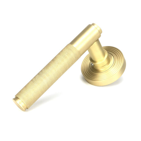 This is an image of From The Anvil - Satin Brass Brompton Lever on Rose Set (Beehive) - Unsprung available to order from T.H Wiggans Architectural Ironmongery in Kendal, quick delivery and discounted prices.