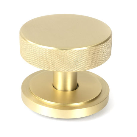 This is an image of From The Anvil - Satin Brass Brompton Centre Door Knob (Art Deco) available to order from T.H Wiggans Architectural Ironmongery in Kendal, quick delivery and discounted prices.