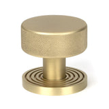 This is an image showing From The Anvil - Satin Brass Brompton Mortice/Rim Knob Set (Beehive) available from trade door handles, quick delivery and discounted prices
