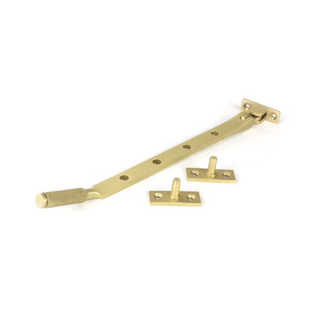 This is an image showing From The Anvil - Satin Brass 10" Brompton Stay available from T.H Wiggans Architectural Ironmongery in Kendal, quick delivery and discounted prices
