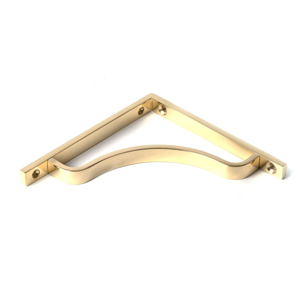 This is an image showing From The Anvil - Polished Brass Abingdon Shelf Bracket (150mm x 150mm) available from trade door handles, quick delivery and discounted prices