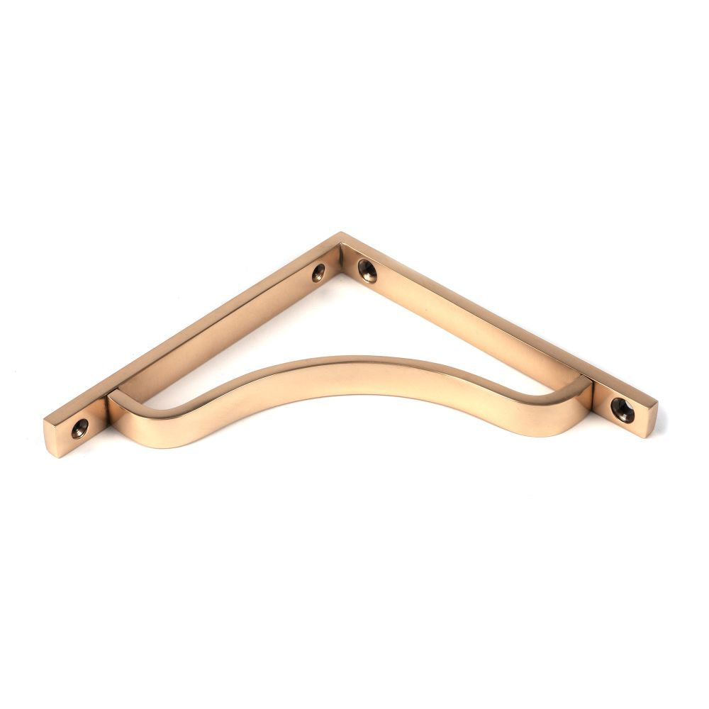 This is an image showing From The Anvil - Polished Bronze Abingdon Shelf Bracket (150mm x 150mm) available from trade door handles, quick delivery and discounted prices