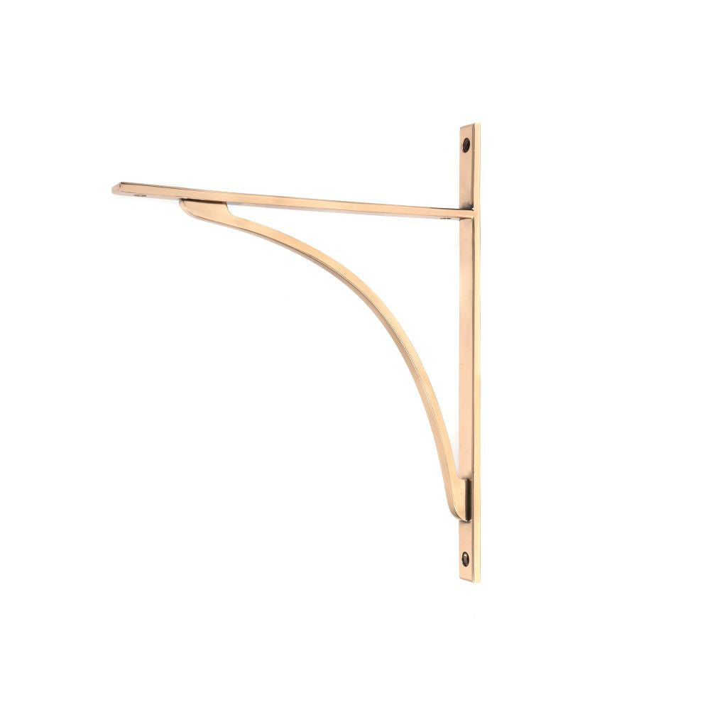This is an image showing From The Anvil - Polished Bronze Apperley Shelf Bracket (314mm x 250mm) available from T.H Wiggans Architectural Ironmongery in Kendal, quick delivery and discounted prices