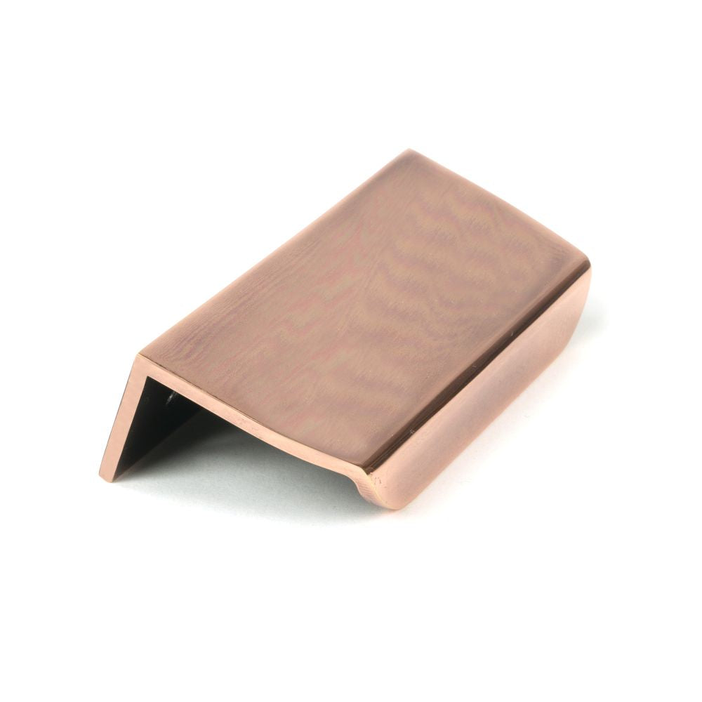This is an image showing From The Anvil - Polished Bronze 100mm Moore Edge Pull available from T.H Wiggans Architectural Ironmongery in Kendal, quick delivery and discounted prices