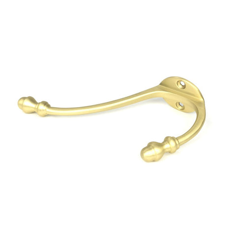 This is an image showing From The Anvil - Satin Brass Hat & Coat Hook available from T.H Wiggans Architectural Ironmongery in Kendal, quick delivery and discounted prices