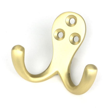 This is an image showing From The Anvil - Satin Brass Celtic Double Robe Hook available from T.H Wiggans Architectural Ironmongery in Kendal, quick delivery and discounted prices