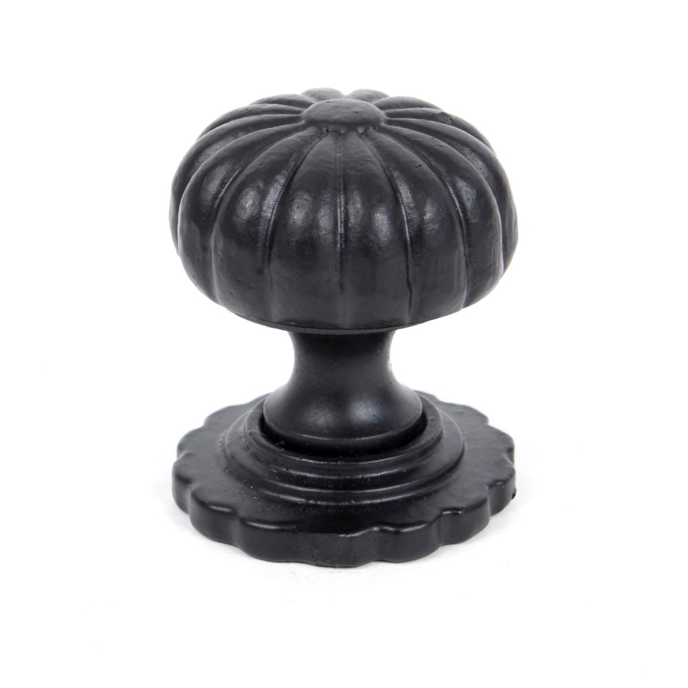 This is an image showing From The Anvil - Black Flower Cabinet Knob - Small available from T.H Wiggans Architectural Ironmongery in Kendal, quick delivery and discounted prices