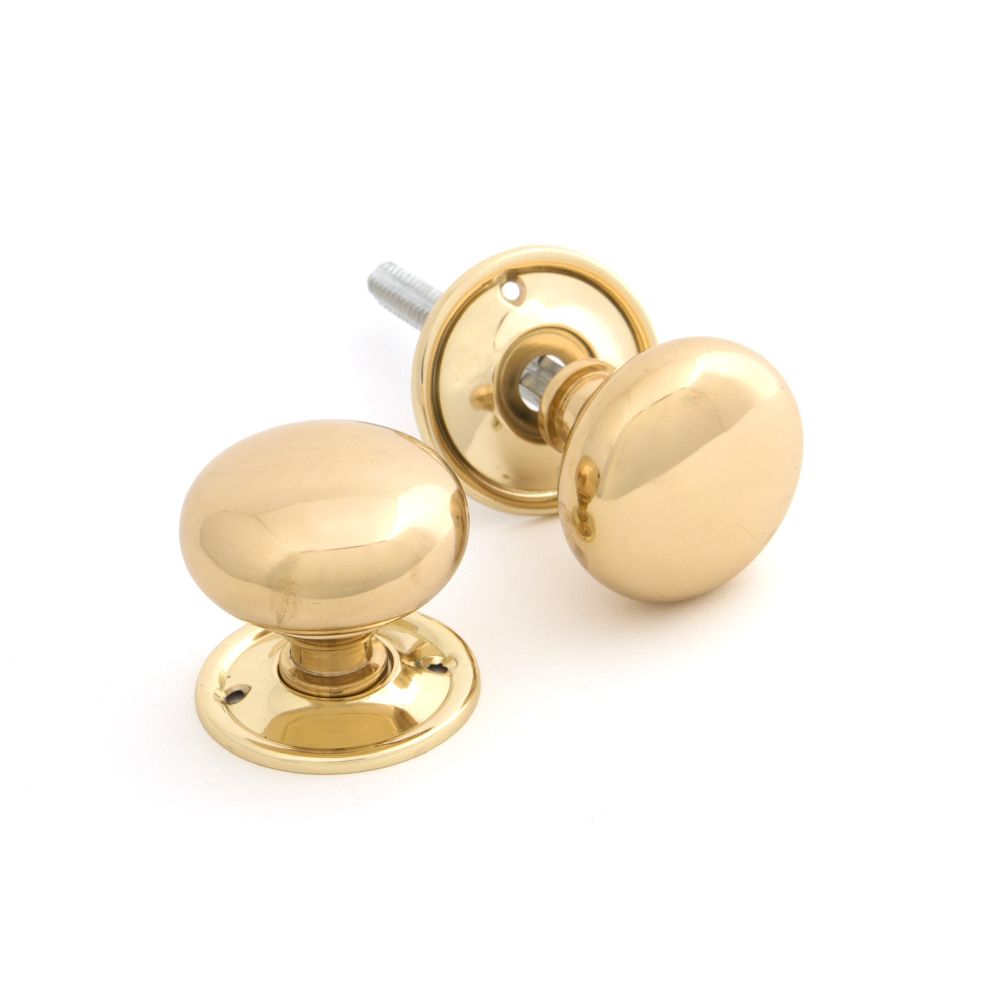 This is an image of From The Anvil - Polished Brass Mushroom Mortice/Rim Knob Set available to order from T.H Wiggans Architectural Ironmongery in Kendal, quick delivery and discounted prices.