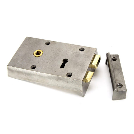 This is an image showing From The Anvil - Iron Left Hand Rim Lock - Small available from T.H Wiggans Architectural Ironmongery in Kendal, quick delivery and discounted prices