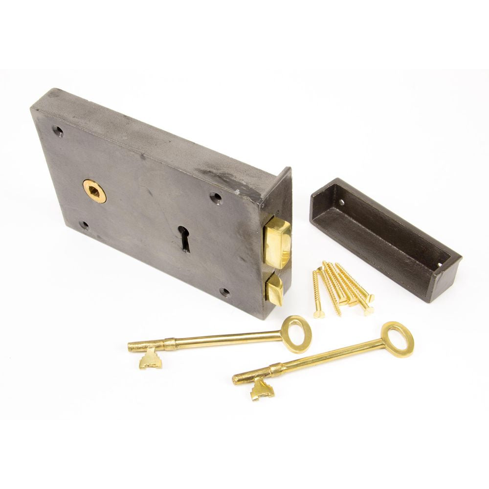 This is an image showing From The Anvil - Iron Left Hand Rim Lock - Large available from T.H Wiggans Architectural Ironmongery in Kendal, quick delivery and discounted prices