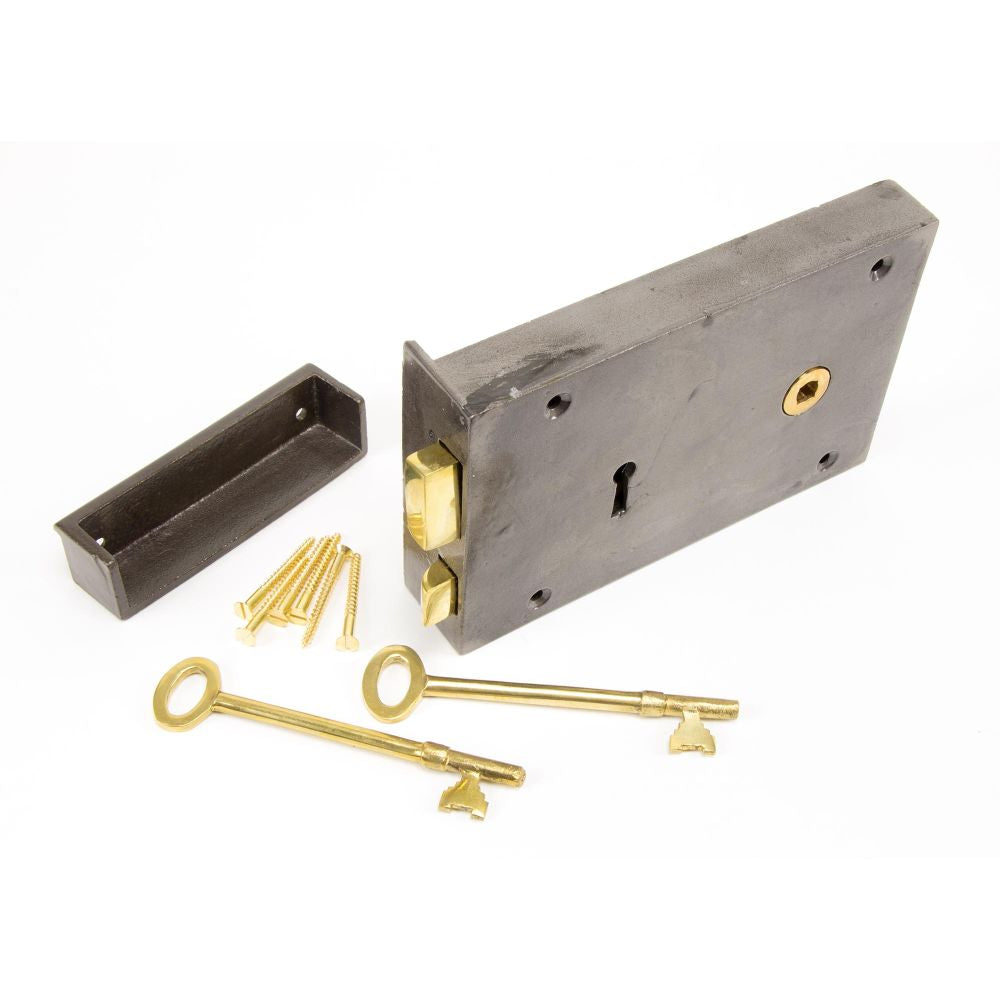 This is an image showing From The Anvil - Iron Right Hand Rim Lock - Large available from T.H Wiggans Architectural Ironmongery in Kendal, quick delivery and discounted prices