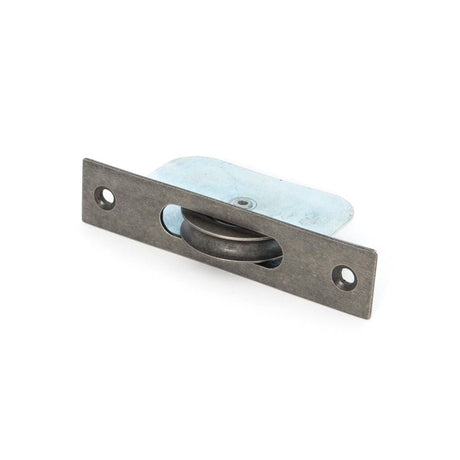 This is an image showing From The Anvil - Antique Pewter Square Ended Sash Pulley 75kg available from T.H Wiggans Architectural Ironmongery in Kendal, quick delivery and discounted prices