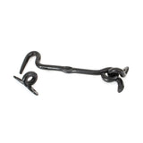 This is an image showing From The Anvil - Black 6" Forged Cabin Hook available from T.H Wiggans Architectural Ironmongery in Kendal, quick delivery and discounted prices