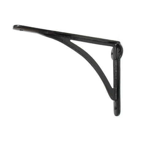 This is an image showing From The Anvil - Black 10'' x 7'' Curved Shelf Bracket available from T.H Wiggans Architectural Ironmongery in Kendal, quick delivery and discounted prices