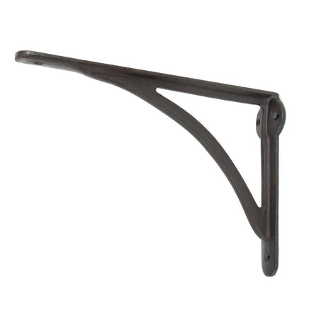 This is an image showing From The Anvil - Beeswax 10'' x 7'' Curved Shelf Bracket available from T.H Wiggans Architectural Ironmongery in Kendal, quick delivery and discounted prices