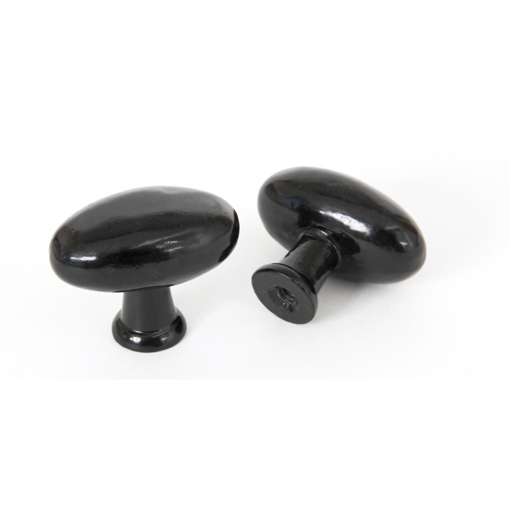 This is an image showing From The Anvil - Black Oval Cabinet Knob available from T.H Wiggans Architectural Ironmongery in Kendal, quick delivery and discounted prices