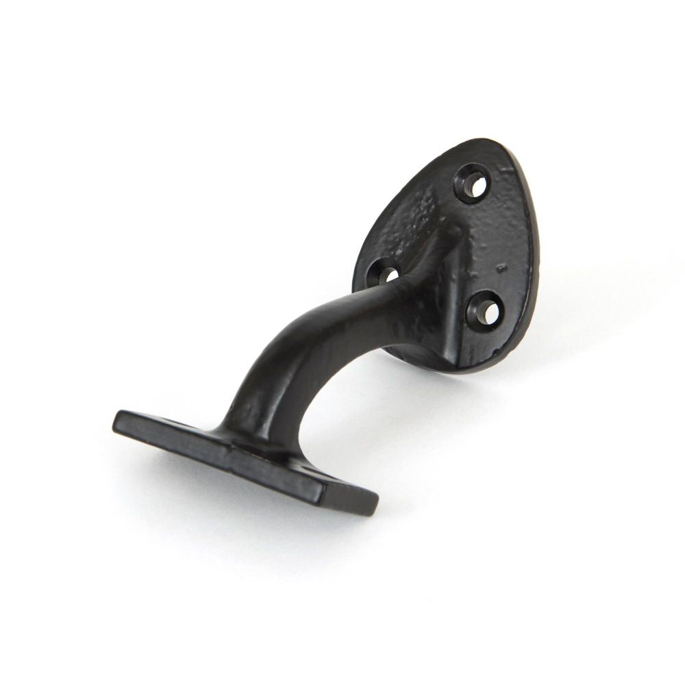This is an image showing From The Anvil - Black 2" Handrail Bracket available from T.H Wiggans Architectural Ironmongery in Kendal, quick delivery and discounted prices