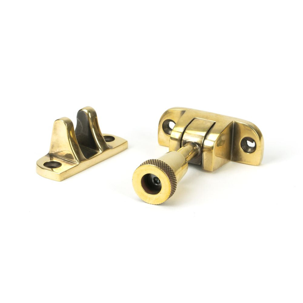 This is an image showing From The Anvil - Aged Brass Brompton Brighton Fastener (Radiused) available from T.H Wiggans Architectural Ironmongery in Kendal, quick delivery and discounted prices