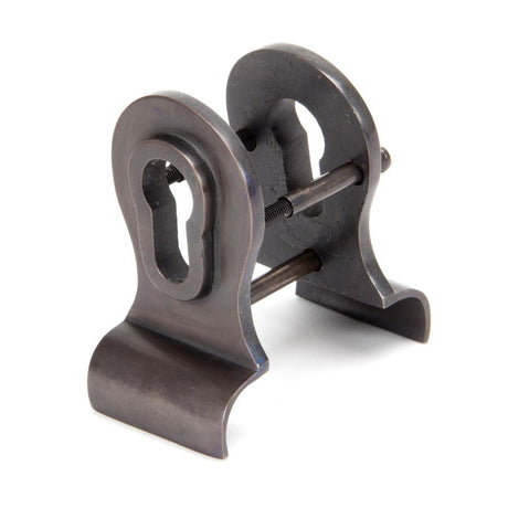 This is an image of From The Anvil - Aged Bronze 50mm Euro Door Pull (Back to Back fixings) available to order from T.H Wiggans Architectural Ironmongery in Kendal, quick delivery and discounted prices.