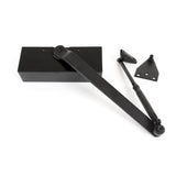 This is an image showing From The Anvil - Black Size 3 Door Closer & Cover available from trade door handles, quick delivery and discounted prices