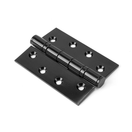 This is an image showing From The Anvil - Black 4" Ball Bearing Butt Hinge (pair) available from T.H Wiggans Architectural Ironmongery in Kendal, quick delivery and discounted prices