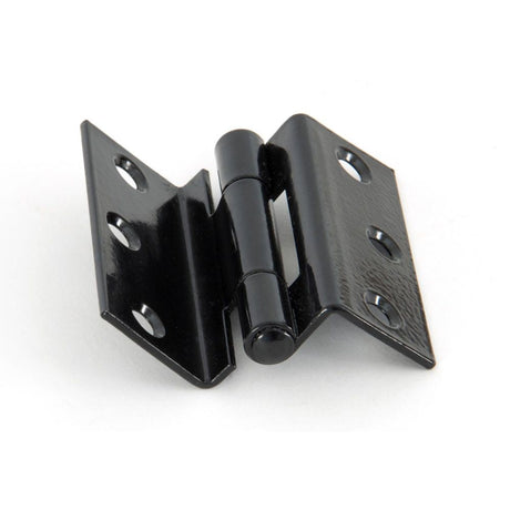 This is an image showing From The Anvil - Black 2 1/2" Stormproof Hinge 1951 (Pair) available from T.H Wiggans Architectural Ironmongery in Kendal, quick delivery and discounted prices