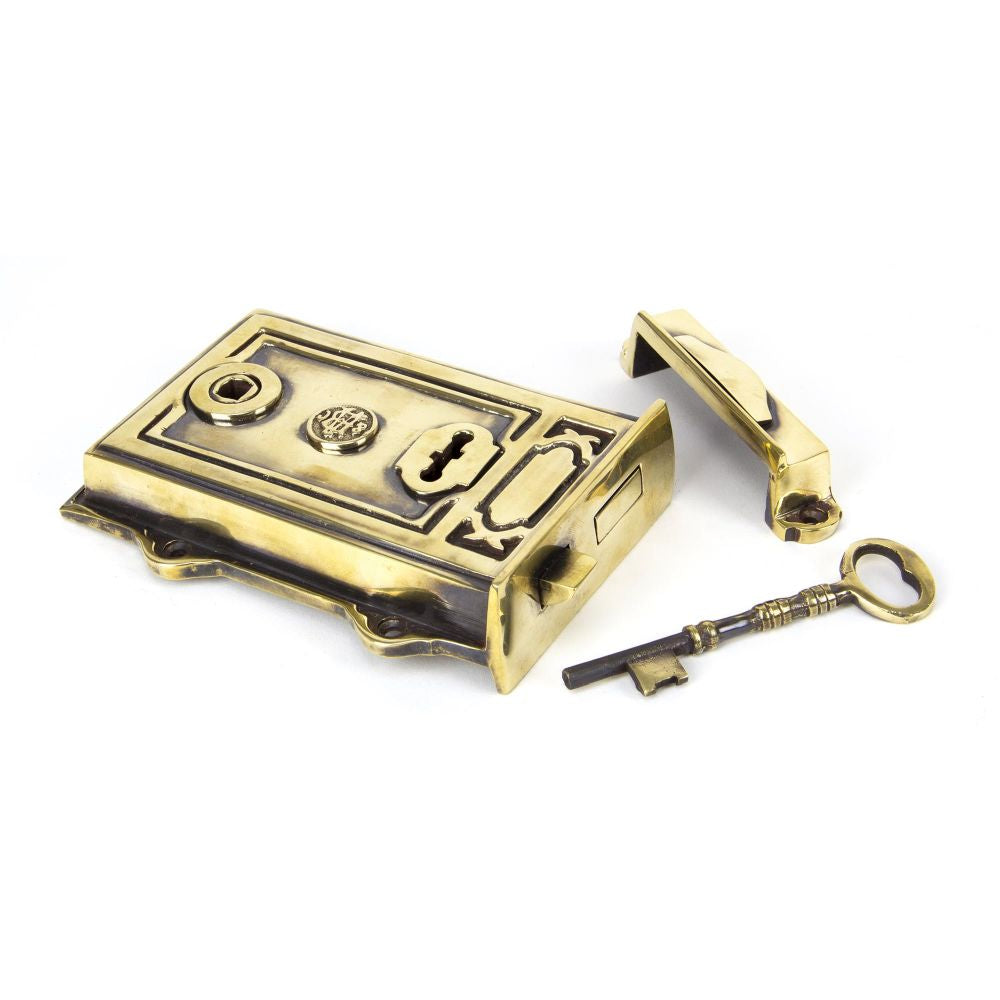 This is an image showing From The Anvil - Aged Brass Davenport Rim Lock available from T.H Wiggans Architectural Ironmongery in Kendal, quick delivery and discounted prices