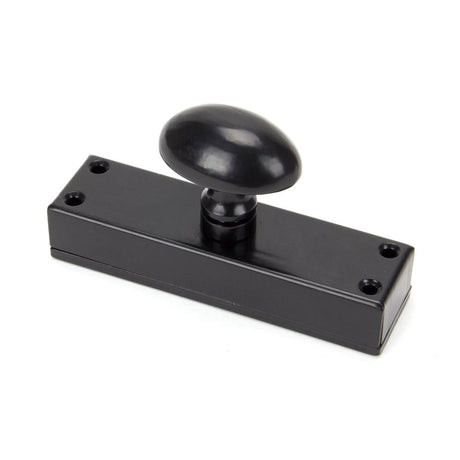 This is an image showing From The Anvil - Black knob for Cremone Bolt available from T.H Wiggans Architectural Ironmongery in Kendal, quick delivery and discounted prices