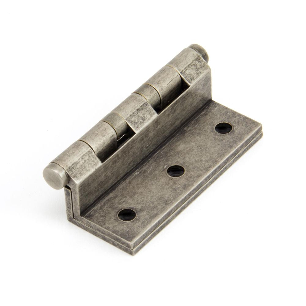 This is an image showing From The Anvil - Antique Pewter 2 1/2" Stormproof Hinge 1951 (pair) available from T.H Wiggans Architectural Ironmongery, quick delivery and discounted prices
