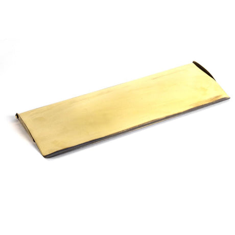 This is an image of From The Anvil - Aged Brass Large Letter Plate Cover 354 x 130mm available to order from T.H Wiggans Architectural Ironmongery in Kendal, quick delivery and discounted prices.
